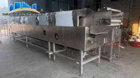 Continuous stainless steel production line for potato chips and shoestring fries, MCI 400 to 500 kg per hour.